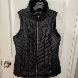 Black faux fur lined vest.